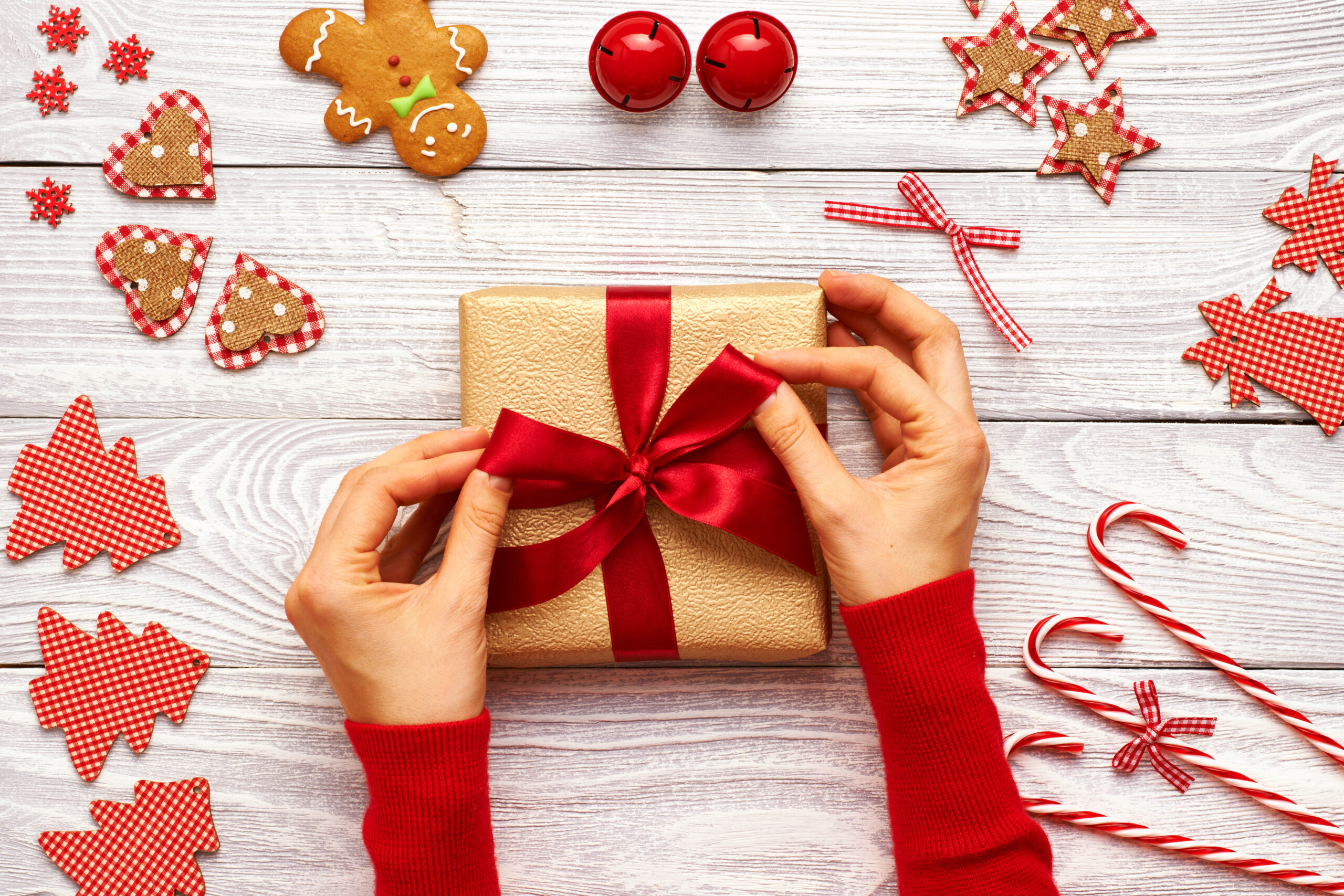 Female hands on christmas gift
